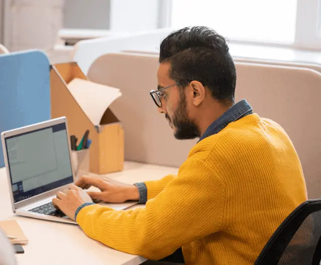 Front-end designer checking a responsive layout across breakpoints