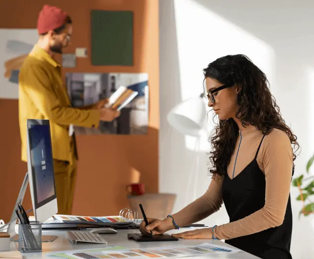 UX designer mapping a user journey on a whiteboard