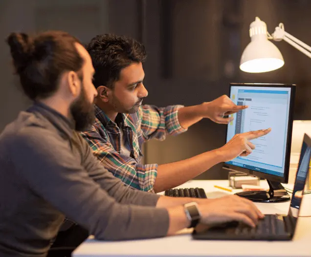 Developers reviewing a Shopify storefront build